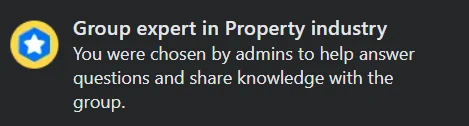 The 'Group expert in Property industry' badge assigned by group admins